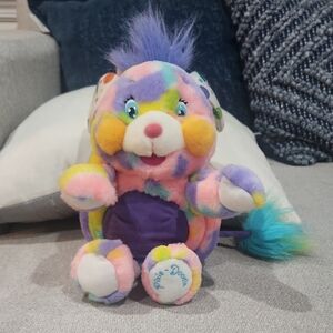 Colorful Plush Toy with Purple Accents